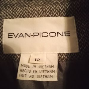 Zip front jacket with matching slacks. Silk lined in both jacket and pants.